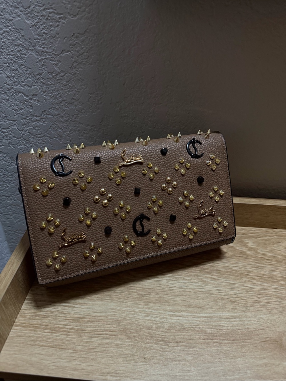 Embellished Brown Leather Clutch with Gold Accents
